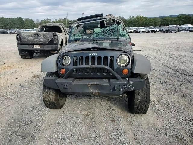 2009 Jeep Wrangler Unlimited X VIN: 1J4GB39119L780313 Lot: 82363625