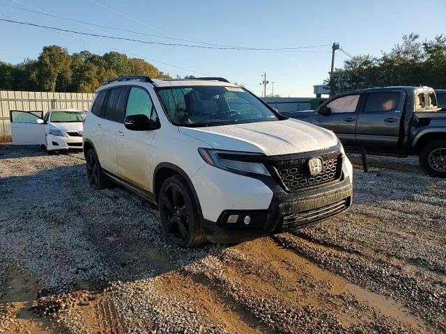 2019 Honda Passport Elite VIN: 5FNYF8H07KB027513 Lot: 90889505