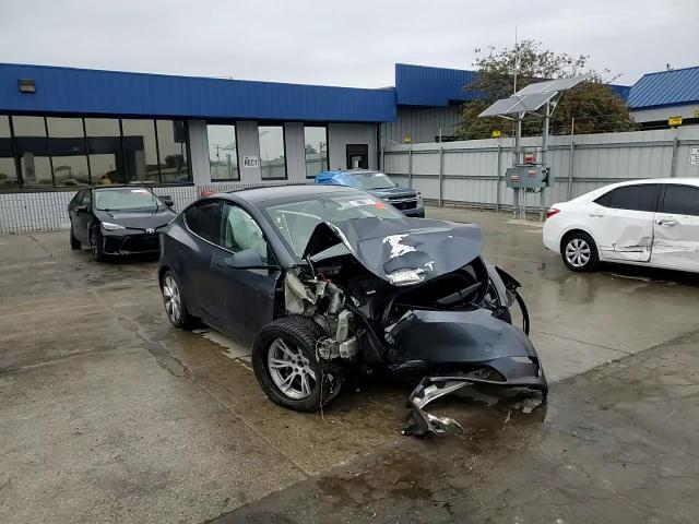 2023 Tesla Model Y VIN: 7SAYGDEE8PA042339 Lot: 86499205