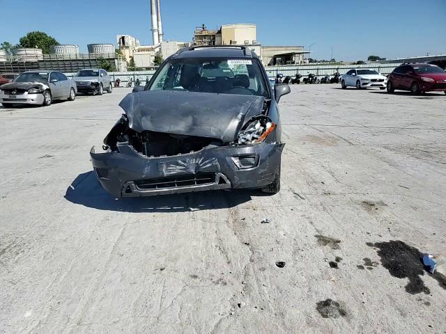 2007 Kia Rondo Base VIN: KNAFG525X77073080 Lot: 85082355