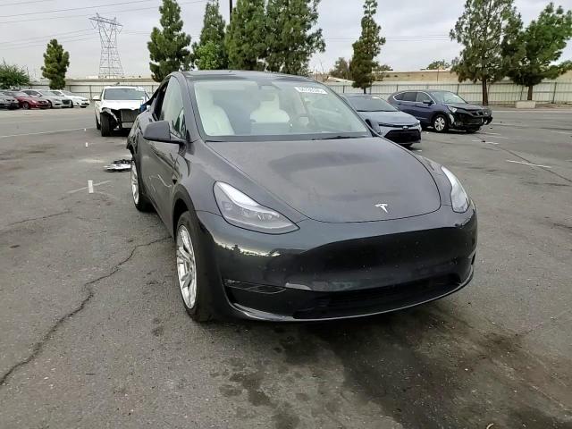 2024 Tesla Model Y VIN: 7SAYGAEE7RF020109 Lot: 84736305