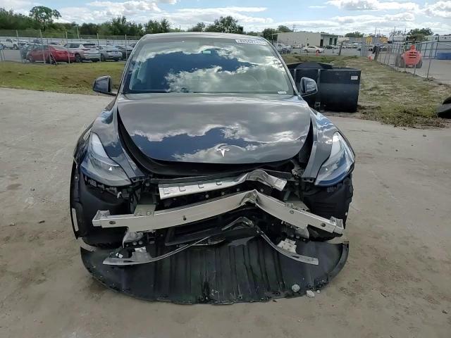 2024 Tesla Model Y VIN: 7SAYGDED8RF055511 Lot: 82562745