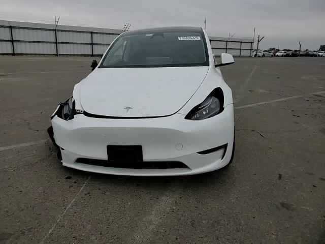 2024 Tesla Model Y VIN: 7SAYGDEE3RF031559 Lot: 86495325