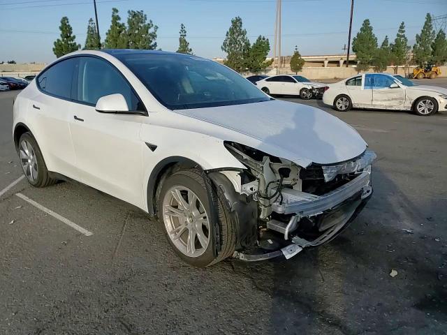 2023 Tesla Model Y VIN: 7SAYGDEE0PA108687 Lot: 89539995