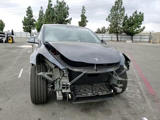 2024 Tesla Model Y VIN: 7SAYGDEE4RA216054 Lot: 84733775
