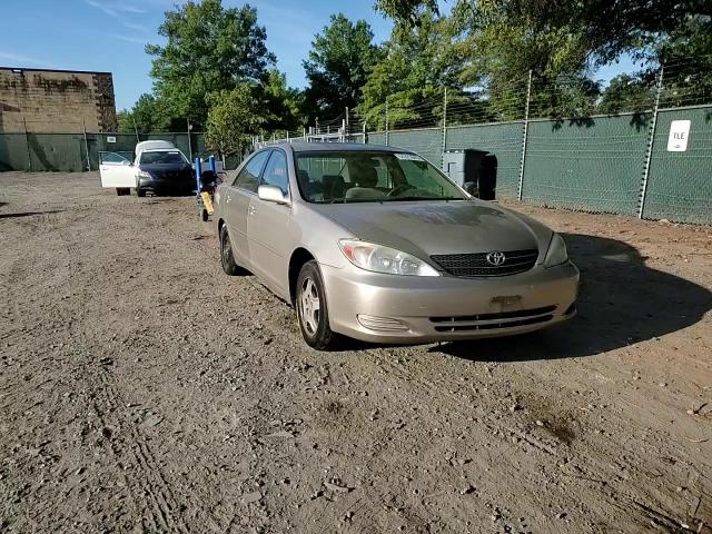 2003 Toyota Camry Le VIN: 4T1BF32K13U556835 Lot: 84925045