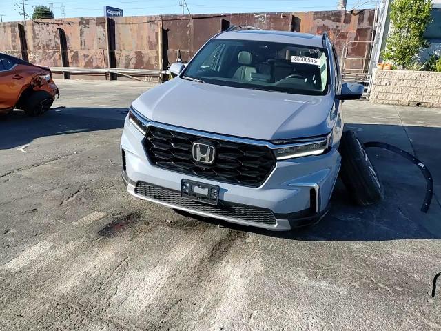 2025 Honda Pilot Touring VIN: 5FNYG1H77SB129976 Lot: 86600545
