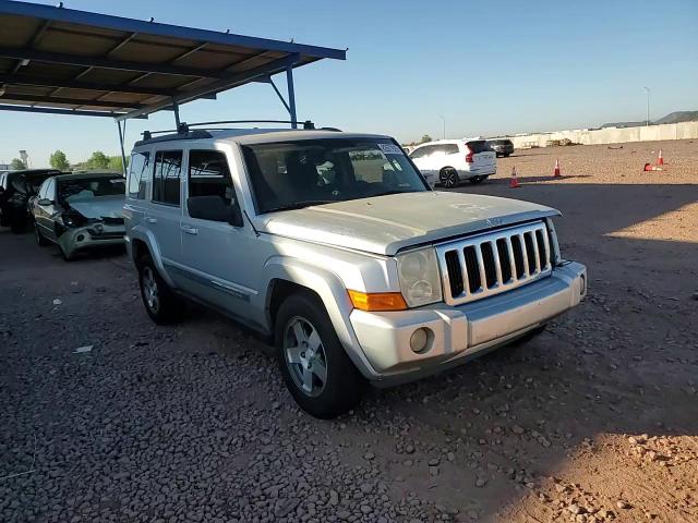 2010 Jeep Commander Sport VIN: 1J4RH4GK1AC103940 Lot: 82677925