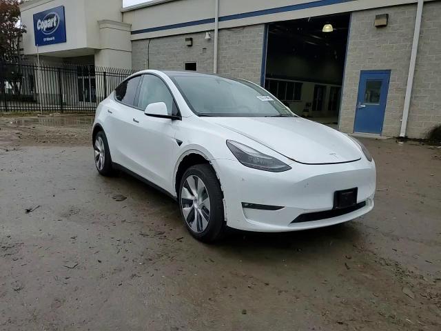 2023 Tesla Model Y VIN: 7SAYGDEE1PF883017 Lot: 90271945