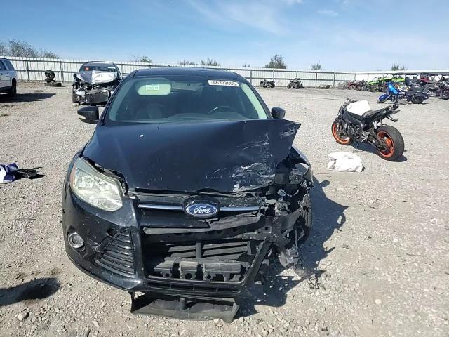 2013 Ford Focus Titanium VIN: 1FADP3J21DL270671 Lot: 86302005