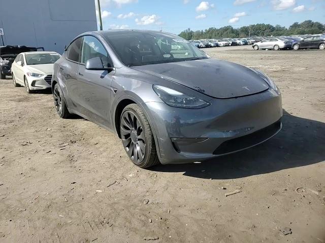 2023 Tesla Model Y VIN: 7SAYGDEF4PF894702 Lot: 84805945