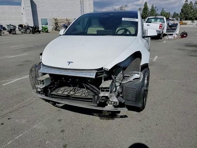 2023 Tesla Model Y VIN: 7SAYGDEF8PF645738 Lot: 84268465