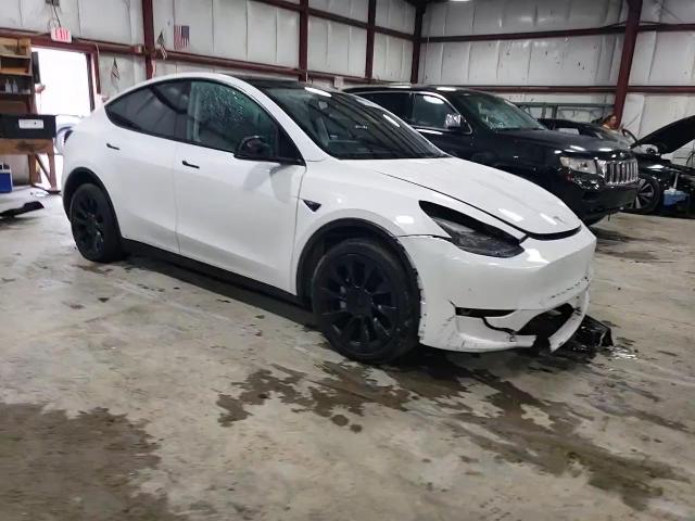 2023 Tesla Model Y VIN: 7SAYGDEE3PF840282 Lot: 82235775