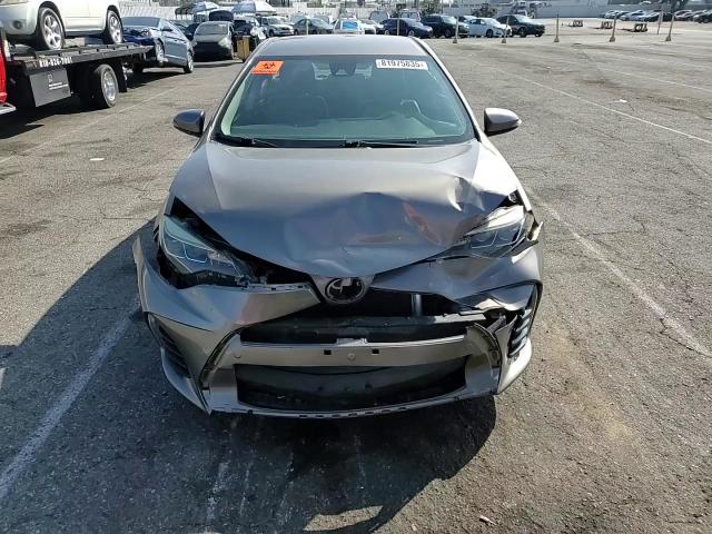 2017 Toyota Corolla L VIN: 5YFBURHEXHP630613 Lot: 81975835