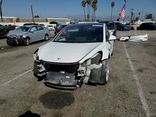 2018 Tesla Model 3 VIN: 5YJ3E1EA6JF126517 Lot: 84910145
