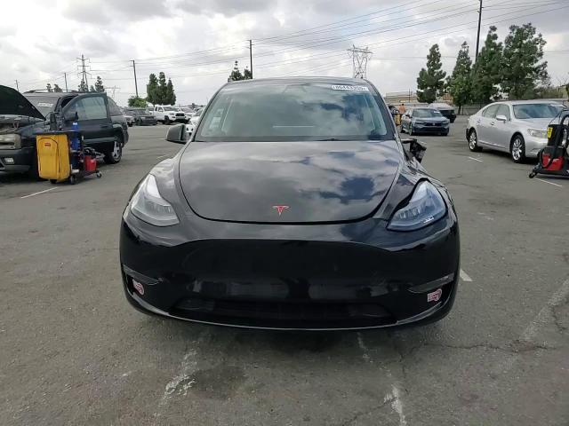 2023 Tesla Model Y VIN: 7SAYGDEE8PF809061 Lot: 86443355