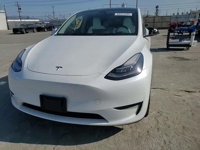 2023 Tesla Model Y VIN: 7SAYGDEE9PA118473 Lot: 89553285