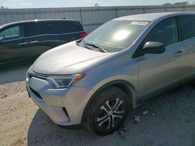 2018 Toyota Rav4 Le VIN: 2T3BFREV0JW709704 Lot: 84770675