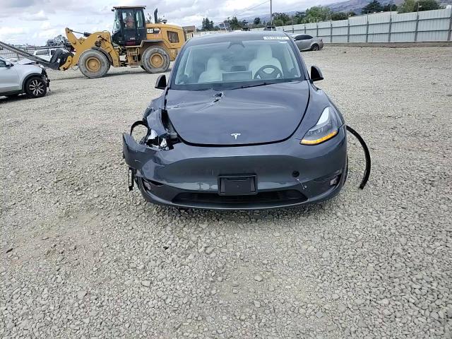 2023 Tesla Model Y VIN: 7SAYGDEF8PF922288 Lot: 85192125