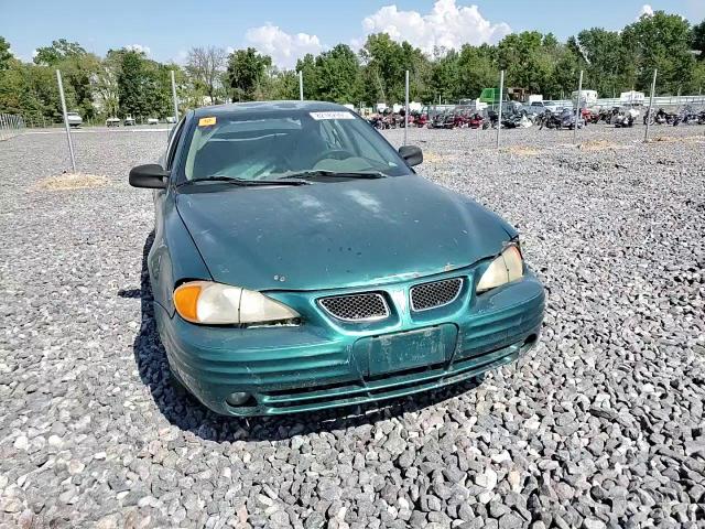 1999 Pontiac Grand Am Se VIN: 1G2NE52T0XM701933 Lot: 82182995