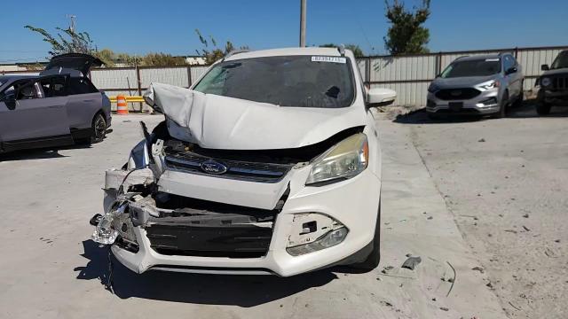 2016 Ford Escape Titanium VIN: 1FMCU0J98GUC91019 Lot: 82394715