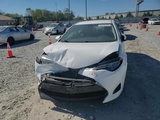 2018 Toyota Corolla L VIN: 5YFBURHE0JP818479 Lot: 82478785
