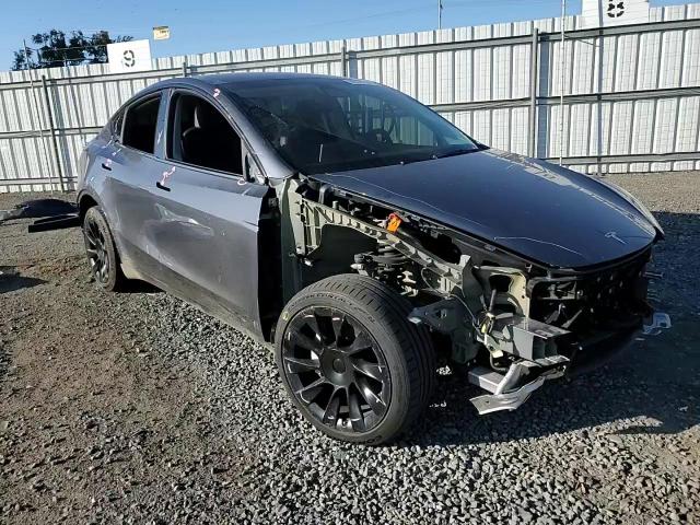 2023 Tesla Model Y VIN: 7SAYGDEE2PA104141 Lot: 85351425