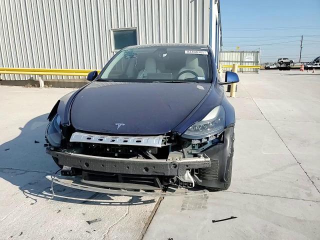 2023 Tesla Model Y VIN: 7SAYGDEF3PF675357 Lot: 84400385