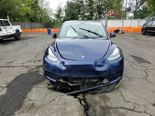 2024 Tesla Model Y VIN: 7SAYGAEE8RF985223 Lot: 86338735