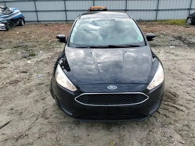 2015 Ford Focus Se VIN: 1FADP3F22FL329786 Lot: 84889115