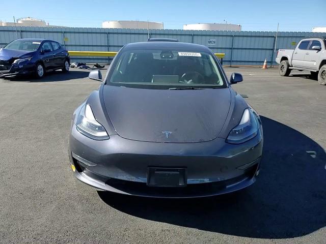 2022 Tesla Model 3 VIN: 5YJ3E1EA8NF209615 Lot: 89894355
