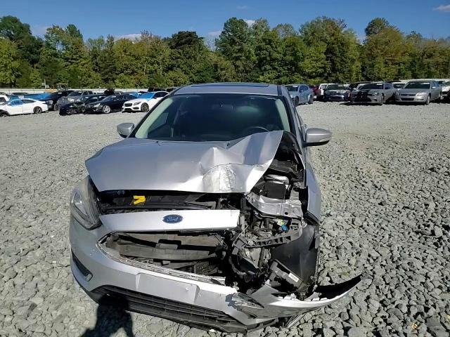 2017 Ford Focus Titanium VIN: 1FADP3N26HL320464 Lot: 82304745