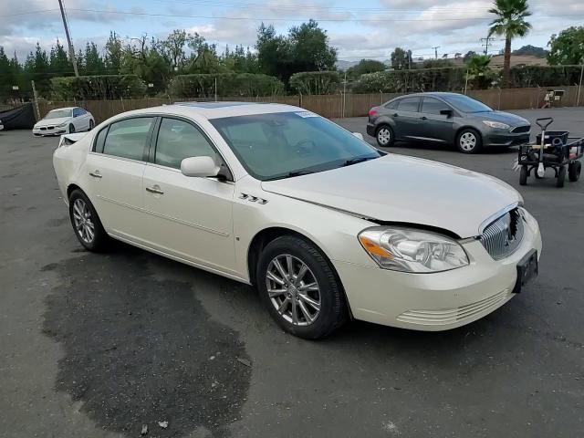 2009 Buick Lucerne Cxl VIN: 1G4HD57M39U124228 Lot: 82356575