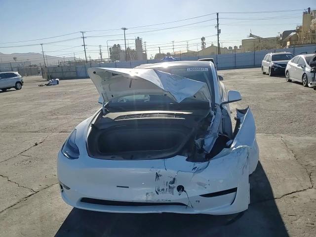 2023 Tesla Model Y VIN: 7SAYGAEE3PF977334 Lot: 90600845