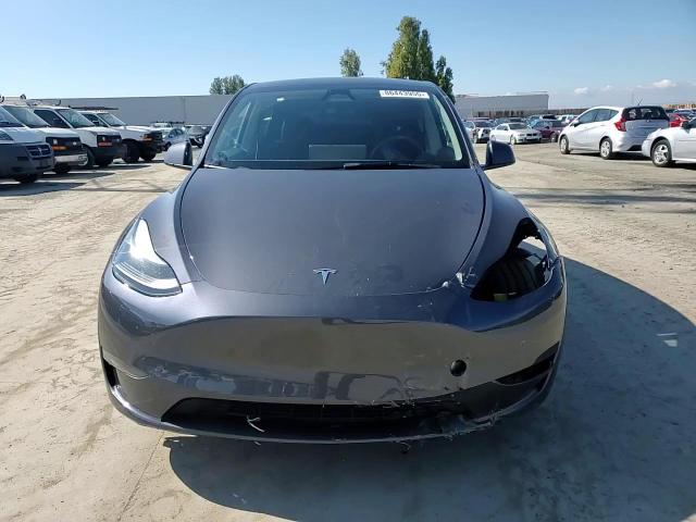 2023 Tesla Model Y VIN: 7SAYGDEE2PF928837 Lot: 86443955