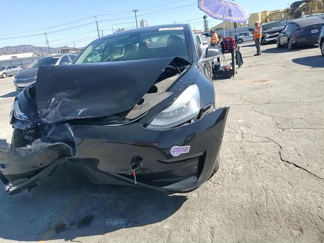 2018 Tesla Model 3 VIN: 5YJ3E1EA5JF157452 Lot: 87300925