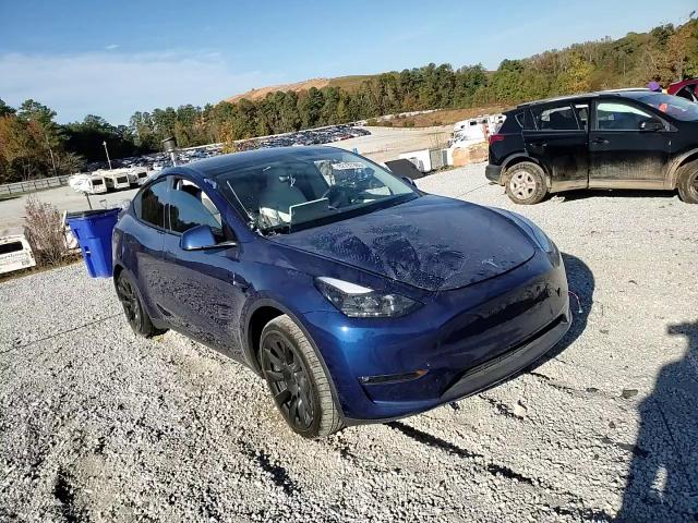 2023 Tesla Model Y VIN: 7SAYGDEE3PF960017 Lot: 82737365