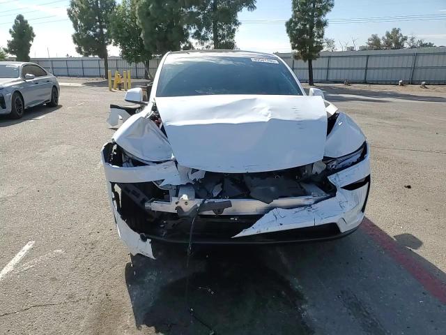 2026 Tesla Model Y VIN: 7SAYGDEE6TF346587 Lot: 89501705