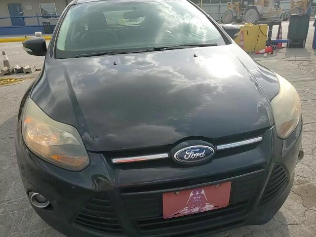 2014 Ford Focus Titanium VIN: 1FADP3N29EL357097 Lot: 86432545