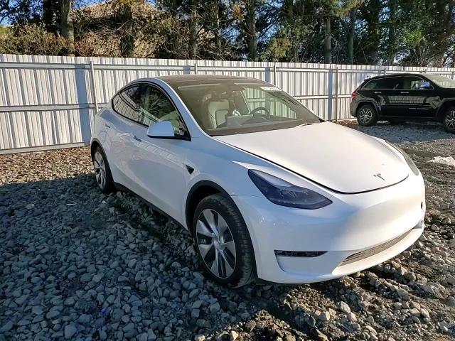 2023 Tesla Model Y VIN: 7SAYGDEE9PF644380 Lot: 87026645