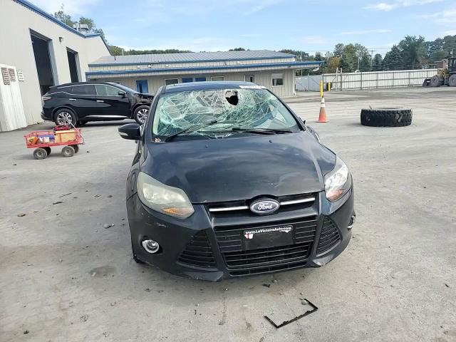 2014 Ford Focus Titanium VIN: 1FADP3J20EL243009 Lot: 81947715