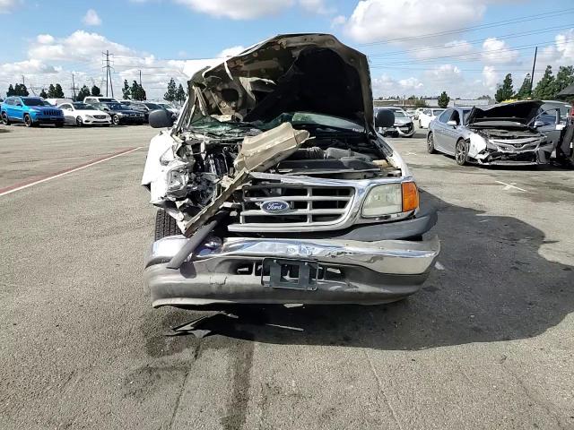 2004 Ford F-150 Heritage Classic VIN: 2FDPF17M84CA31986 Lot: 86288765