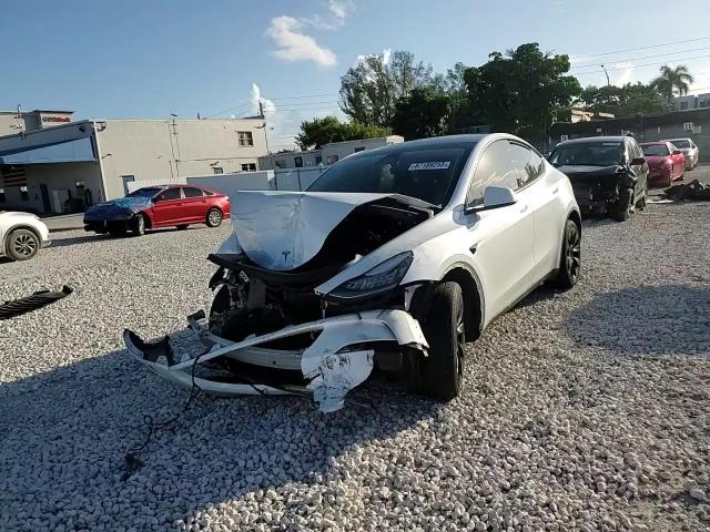2023 Tesla Model Y VIN: 7SAYGDEE6PA027192 Lot: 87189255