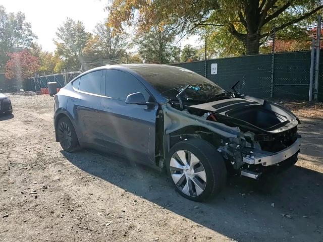2023 Tesla Model Y VIN: 7SAYGDEE4PA213099 Lot: 86671035