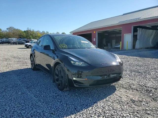 2025 Tesla Model Y VIN: 7SAYGAEE1SF284867 Lot: 85909375