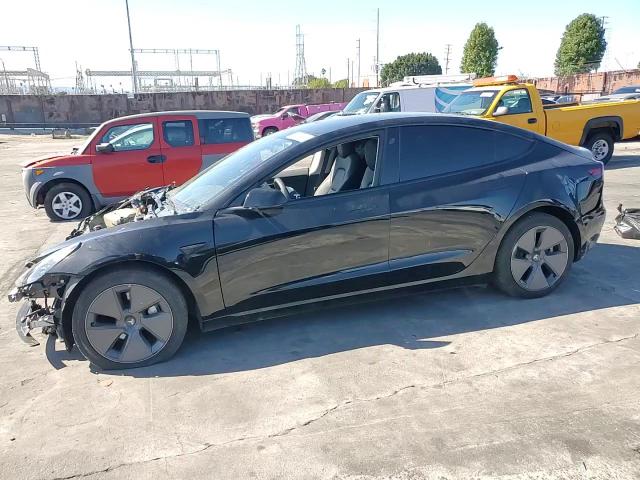 2023 Tesla Model 3 VIN: 5YJ3E1EA5PF715986 Lot: 87242485