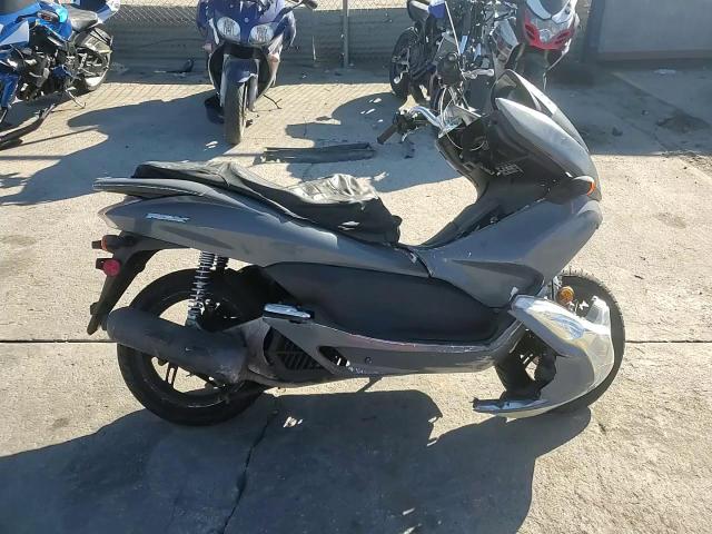 2011 Honda Pcx VIN: MLHJF280XB5001260 Lot: 89894885