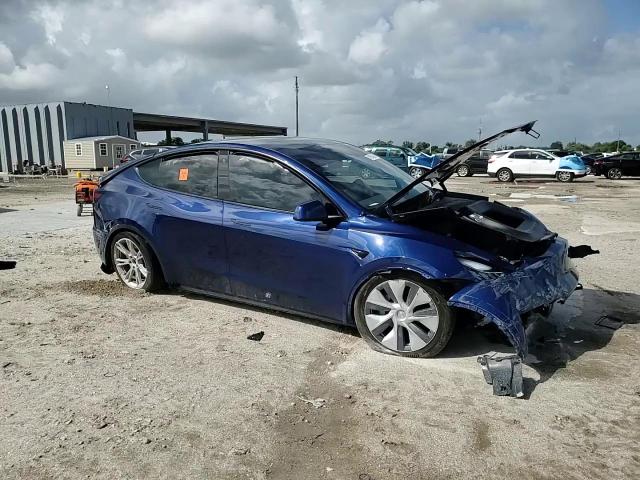 2023 Tesla Model Y VIN: 7SAYGDEE8PA111272 Lot: 81954625