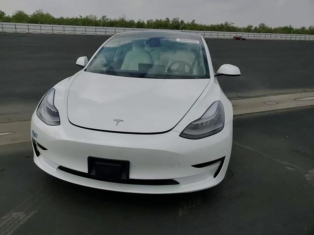 2021 Tesla Model 3 VIN: 5YJ3E1EB8MF999389 Lot: 89869385