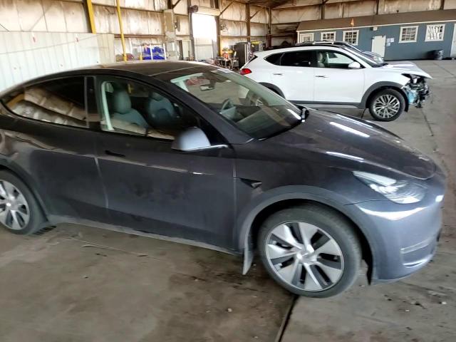 2023 Tesla Model Y VIN: 7SAYGDEE4PA151171 Lot: 87402605